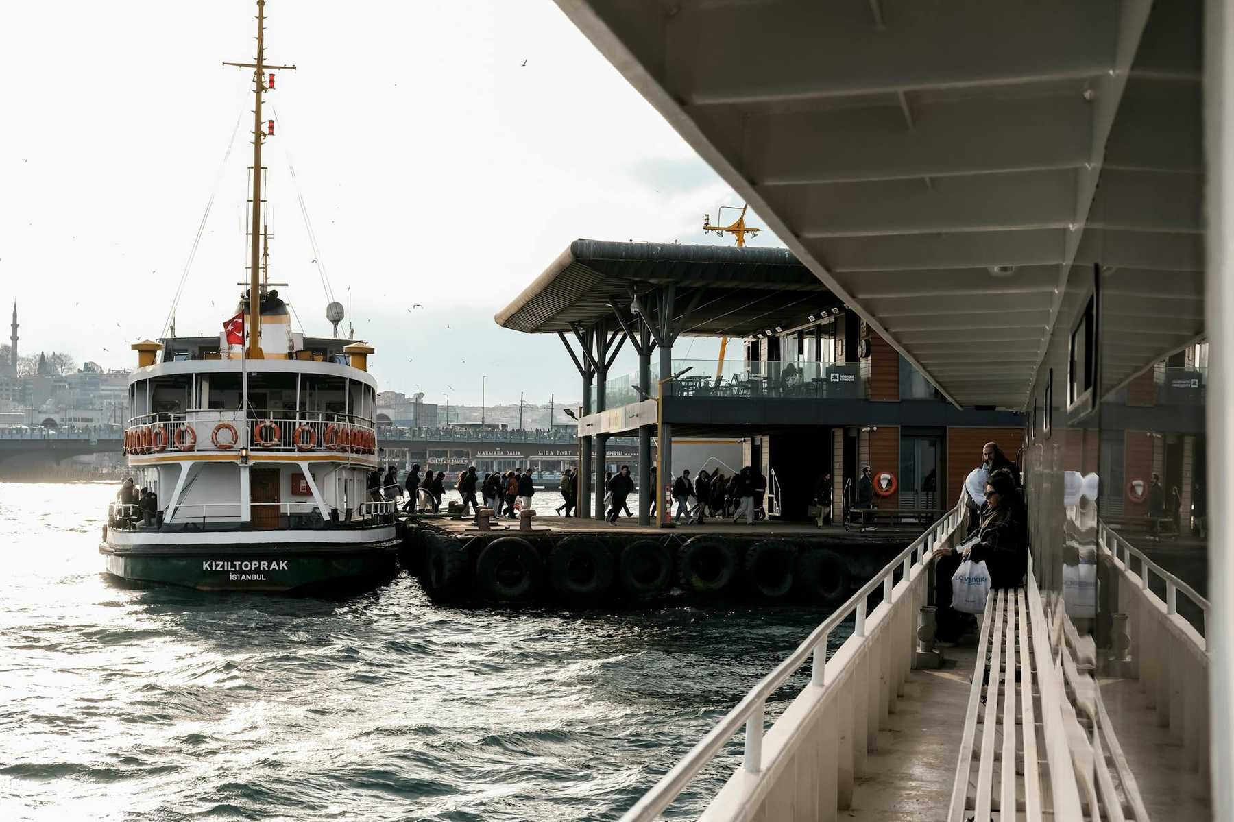 Commuter ferry at a terminal like Auckland Downtown Ferry Terminal