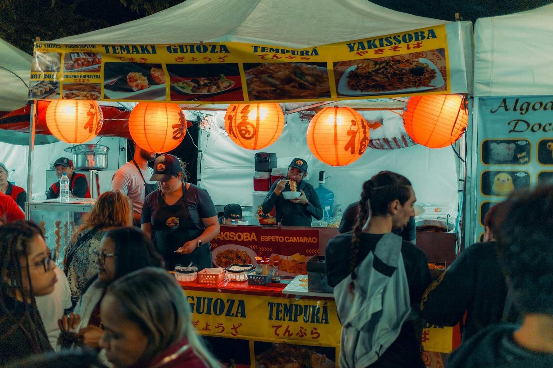 Night market with street food vendors similar to Auckland night markets